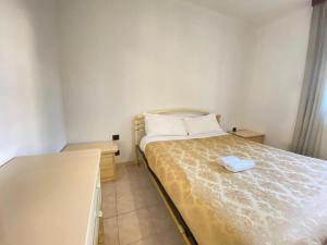Łóżko lub łóżka w pokoju w obiekcie Bisceglie at home