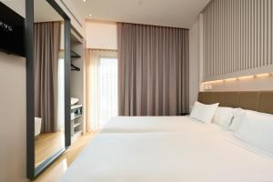 Hotel Kivir客房内的一张或多张床位