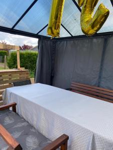 En balkon eller terrasse på Maison de vacances