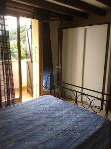 Postel nebo postele na pokoji v ubytování Le RENDEZ VOUS DE L'ETE