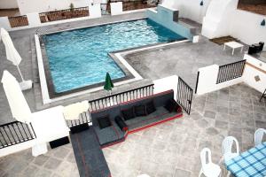 an overhead view of a large swimming pool at Spacious villa with private pool in Djerba in Houmt Souk