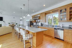 A kitchen or kitchenette at Hamptons Home Near Beaches with Pool and Water Views!