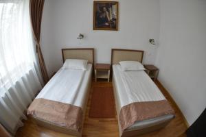 Postel nebo postele na pokoji v ubytování Hotel Posada