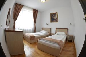 Postel nebo postele na pokoji v ubytování Hotel Posada