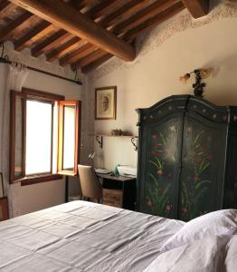 A bed or beds in a room at Villino San Silvestro Még 20 kép