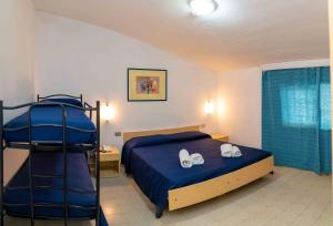 Postel nebo postele na pokoji v ubytování Hotel dei Focesi + 29 fotografií