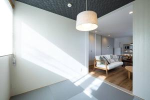 Postel nebo postele na pokoji v ubytování Aile House Ⅰ