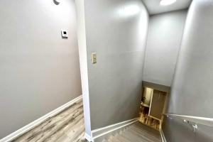 a view of a hallway with a floor defect in a room at Gulfside Townhome 13 Townhouse in Gulf Shores