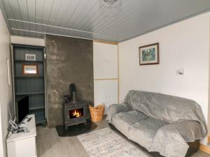 Posezení v ubytování Curragh Cottage