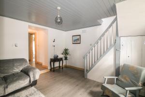 Posezení v ubytování Curragh Cottage