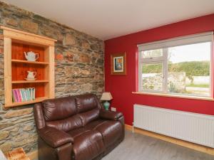 Posezení v ubytování Curragh Cottage
