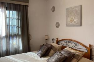 Postel nebo postele na pokoji v ubytování Sun&Relax Apto 2dormitorios 6-7pWifi&Piscina