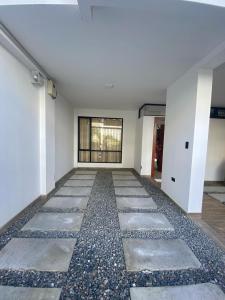 an empty room with rocks on the floor at Pent House Exclusivo in Loja