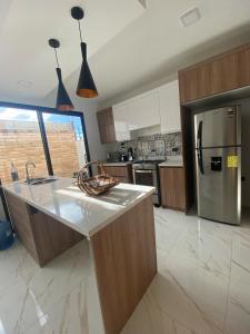 Kuchyň nebo kuchyňský kout v ubytování Pent House Exclusivo