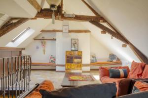 Posezení v ubytování Jacuzzi et Vue sur Loire - Maison d'hôtes L'Odyssée