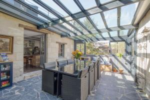 Posezení v ubytování Jacuzzi et Vue sur Loire - Maison d'hôtes L'Odyssée