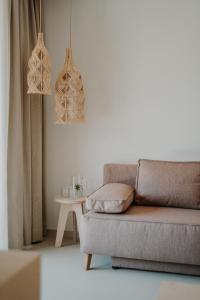 a living room with a couch and a table at Wanda Apartments in Parcines