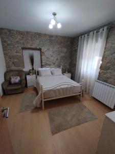 Giường trong phòng chung tại Casa do Ribeiro