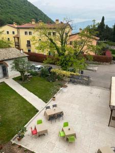 an overhead view of a patio with tables and chairs at Locanda Moscal in Affi