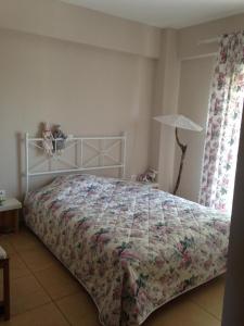 Ένα ή περισσότερα κρεβάτια σε δωμάτιο στο V&V Appartement