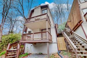 a house with stairs leading up to it at 30A Creekside in Banner Elk