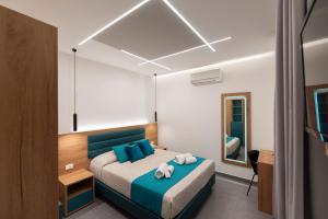 Room & Breakfast Aloe客房内的一张或多张床位