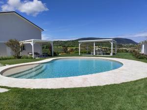 Bazén v ubytování Le Nereidi Green Resort Elisa nebo v jeho okolí