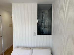 Posteľ alebo postele v izbe v ubytovaní Livemálaga Malagueta