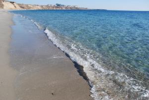 a sandy beach with waves coming in from the ocean at Studio Marina Cape 89 in Aheloy +63 photos