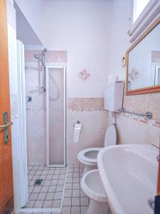 Koupelna v ubytování Hotel Rosa