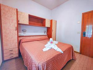 Postel nebo postele na pokoji v ubytování Hotel Rosa
