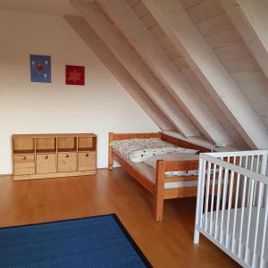 Postel nebo postele na pokoji v ubytování Jurasonne
