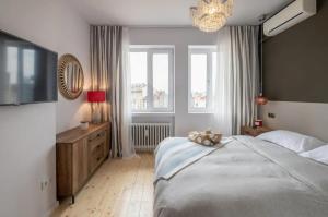 Een bed of bedden in een kamer bij Appartamento accogliente e spazioso