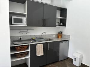 Köök või kööginurk majutusasutuses Appartement Coco