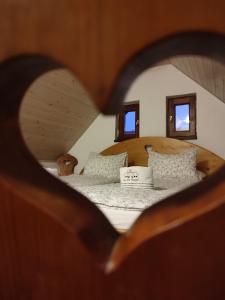 En eller flere senge i et værelse på Szent Iván Vendégház