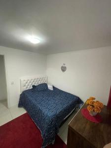 Postel nebo postele na pokoji v ubytování Quartos - Cíntia + 24 fotografií