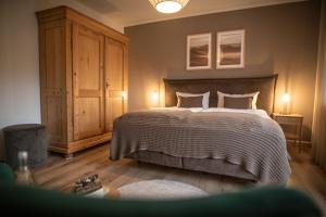 Ένα ή περισσότερα κρεβάτια σε δωμάτιο στο Landgasthaus & Hotel zur Krone