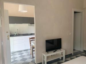 Televízia a/alebo spoločenská miestnosť v ubytovaní Paradisa28 - Amalfi - Zona Ospedale Cisanello