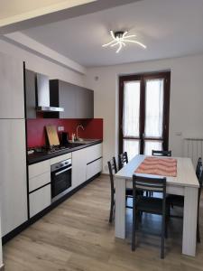 Kuchyň nebo kuchyňský kout v ubytování Casa di Sabrina