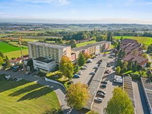 Letecký snímek ubytování Panoramasuite 81 - See- und Bergblick sowie beheizter Indoor-Pool