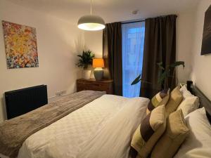 Lombok Apartment near Old Street,Islington,Angel客房内的一张或多张床位