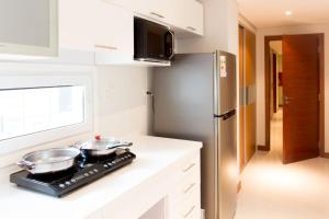 ครัวหรือมุมครัวของ Asunción Rent Suites Santa Teresa