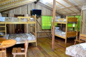 Postel nebo postele na pokoji v ubytování Hosteria Kindi Wasi