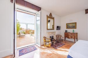 Postel nebo postele na pokoji v ubytování Terrazza Monteroduni 16