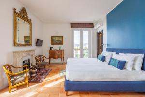Postel nebo postele na pokoji v ubytování Terrazza Monteroduni 16