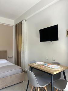 TV a/nebo společenská místnost v ubytování Blossom Apartments
