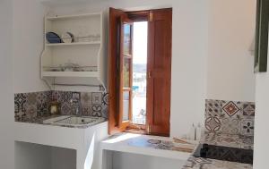 Kuchyň nebo kuchyňský kout v ubytování Villa Patmos Netia - Location Xoxlakas + 37 fotografií