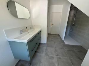 Koupelna v ubytování Maison bord de mer + 4 fotografie