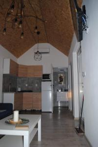 Köök või kööginurk majutusasutuses Domki nad morzem, Laba Rusinowo koło Jarosławca,