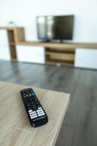 TV a/nebo společenská místnost v ubytování Panorama Residence
